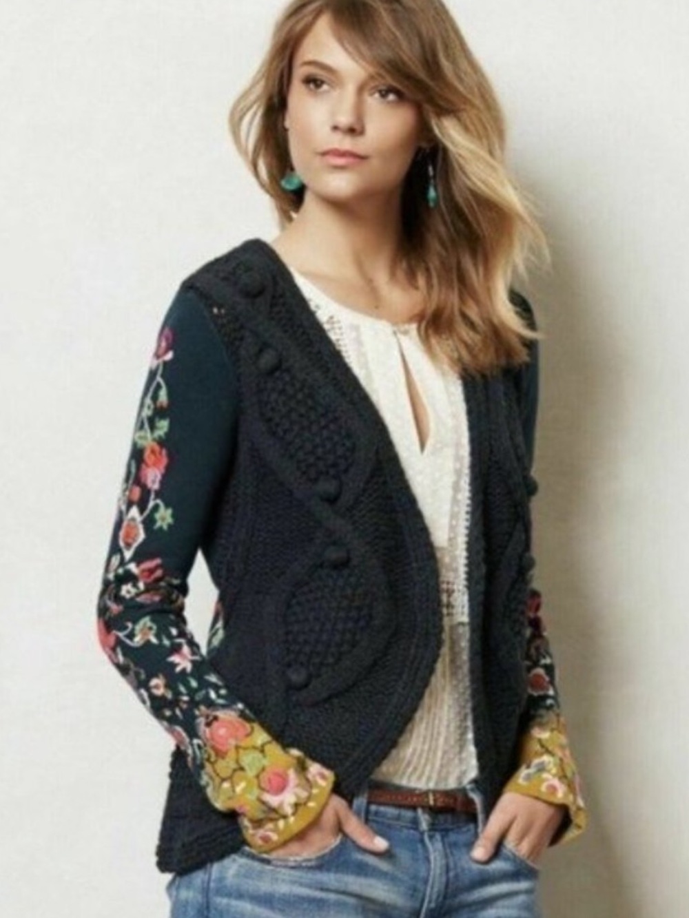 anthropologie navy Embroidered Cable-Knit Cardigan Sweater sleeping on snow